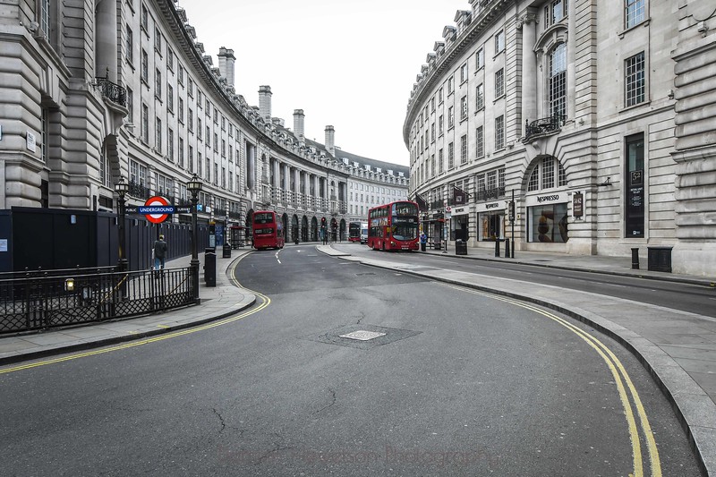 Buy photo of Deserted London with Red London Busses